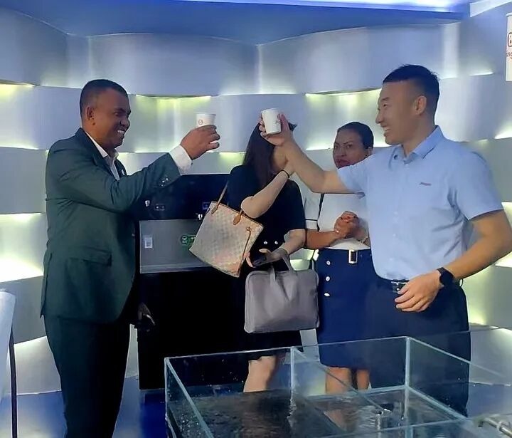 Tasting the product water from the demonstration unit